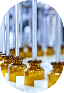 Brown medicine glass bottles on production line.