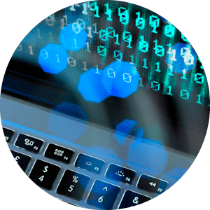 Fibre optic data containing a computer virus hitting a laptop screen.