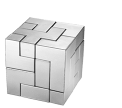 Silver completed puzzle cube on blue background